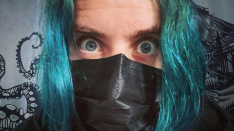 Christopher long-haired selfie in mask mode