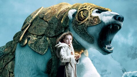 Little girl standing with a warrior polar bear in totally sweet golden armor Golden Compass movie backdrop
