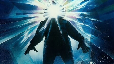 Snow-suited man with light exploding from face The Thing movie backdrop