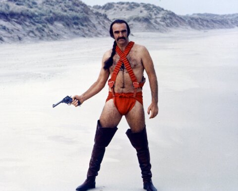 Shaun Connery in an amazing red bandolier/codpiece get-up, brandishing a pistol