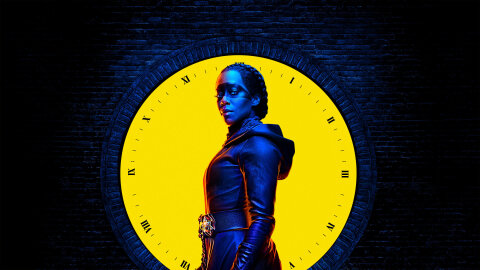 Sister Night in front of a yellow clockface, Watchmen backdrop