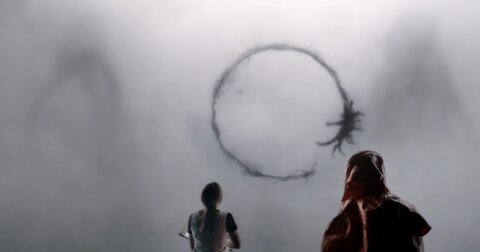 Drawing weird inky three-dimensional symbols in the mist Arrival movie backdrop